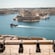 Cannons overlooking Grand Harbor in Valletta and the city in the background